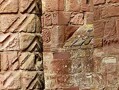 A pillar at Lindisfarne Priory, showing the chevron or zigzag design, which is also seen on the pillars of Durham Cathedral. As the priory was built by the Durham-based community of St. Cuthbert after the construction of the cathedral, it is likely that the same masons worked on both buildings, hence explaining the similarities.