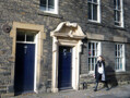 A nineteenth-century remodelling of the facade of a 17th century building on North Bailey. Often, the remodelling of facades was done simply to make buildings look fashionable. The elaborate doorway on the right is the original 17th century one, however.