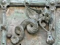 Troia Cathedral Doorknocker. Part of an elaborate bronze door made in 1119, Troia Cathedral, Italy. Unlike the Sanctuary Knocker at Durham Cathedral, the dragon here looks almost friendly. In terms of their concept though, the two knockers have something in common.